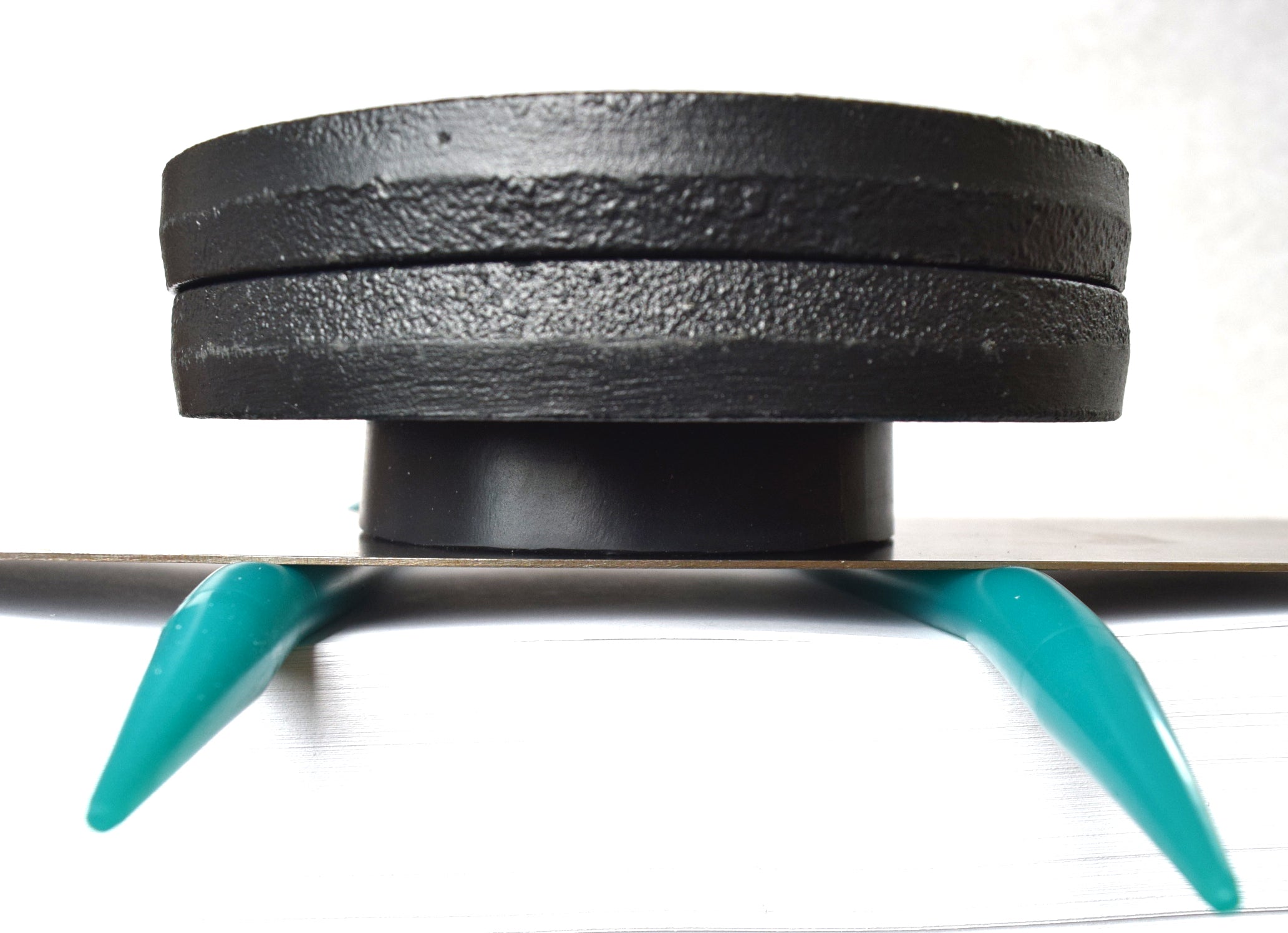 Compression test showing a 10 lb weight compressing a 00-20 silicone tube under a flat steel plate
