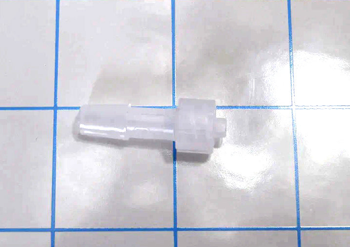 Single 1/4 inch barbed quick twist disconnect component on a grid surface.