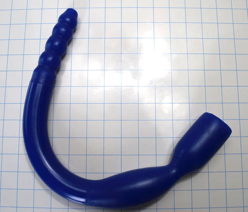 1.35-inch diameter, 18-inch blue silicone colon tube with Tip A design and 1.75-inch flange, shown on a grid background, piece spread out