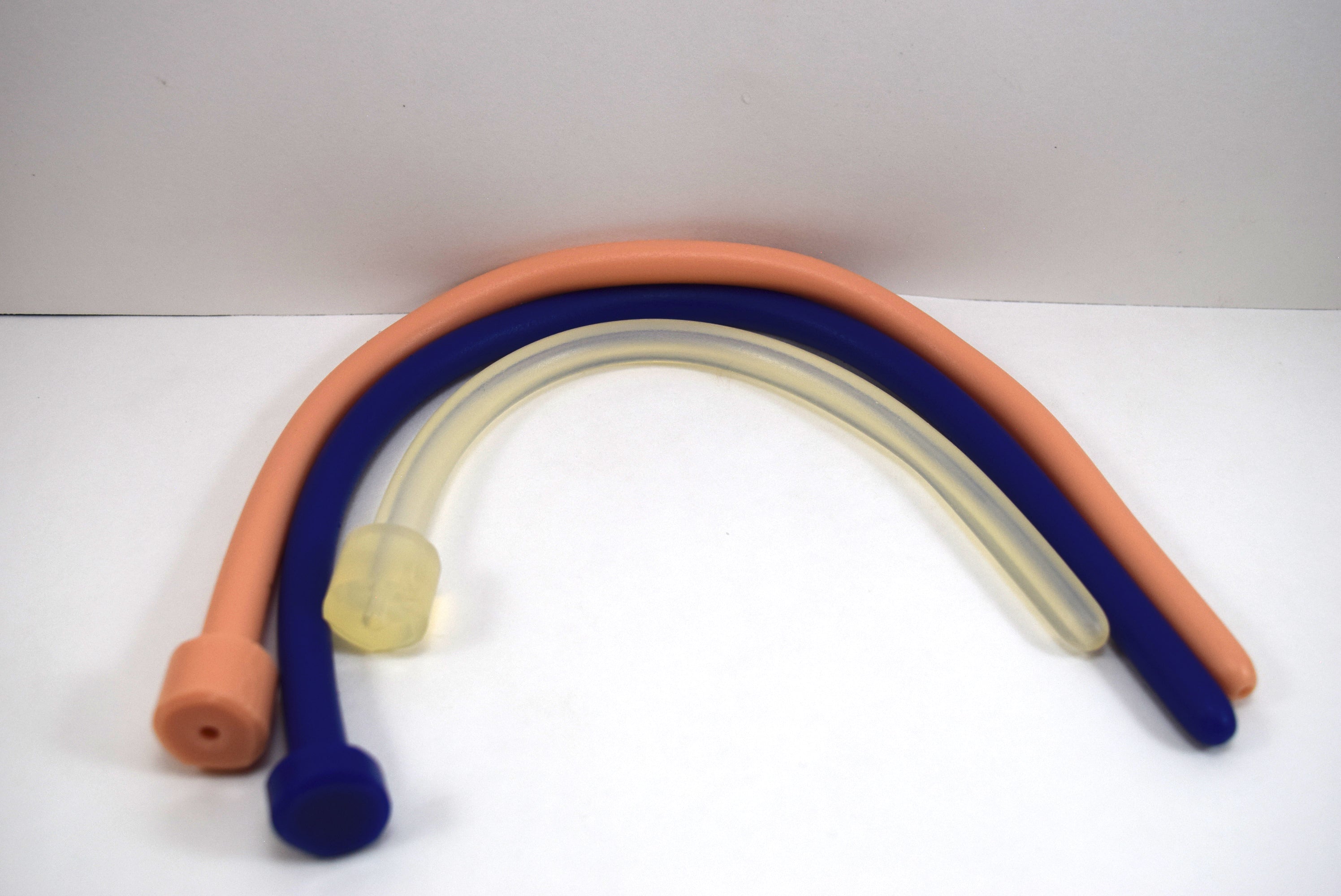 Assorted colorful 11mm 33 French ball tip silicone sound probes with polished shafts and safety flanged bases.