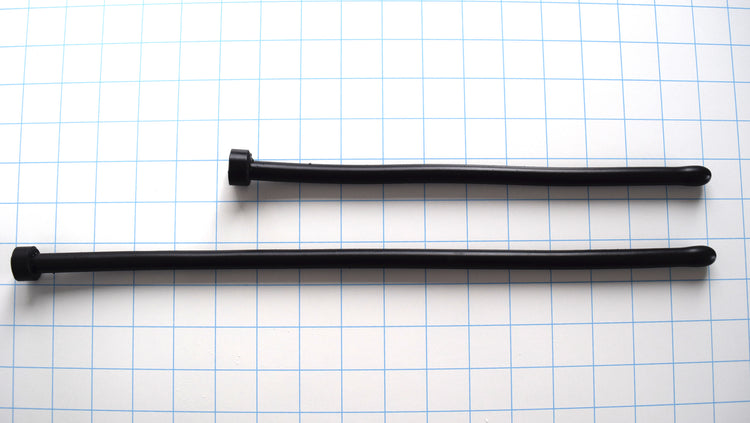 Two black 11mm 33 French ball tip silicone sound probes shown in different lengths on a grid background.