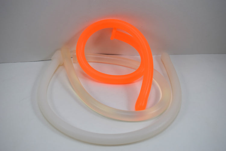 Flexible yellow, red, and green 11mm 33 French ball tip silicone sound probes coiled on a white background.