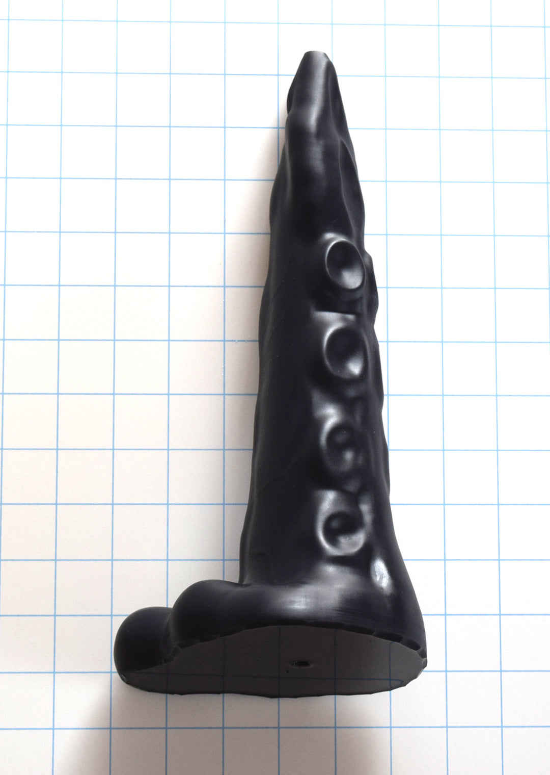 Front view of a 12-inch large black silicone tentacle nozzle featuring detailed suction cups and a 3-inch max diameter.