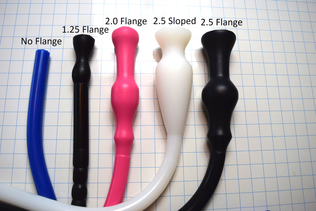 Comparison of silicone colon tube flange sizes, including no flange, 1.25-inch, 2.0-inch, 2.5-inch sloped, and 2.5-inch standard designs on a grid background