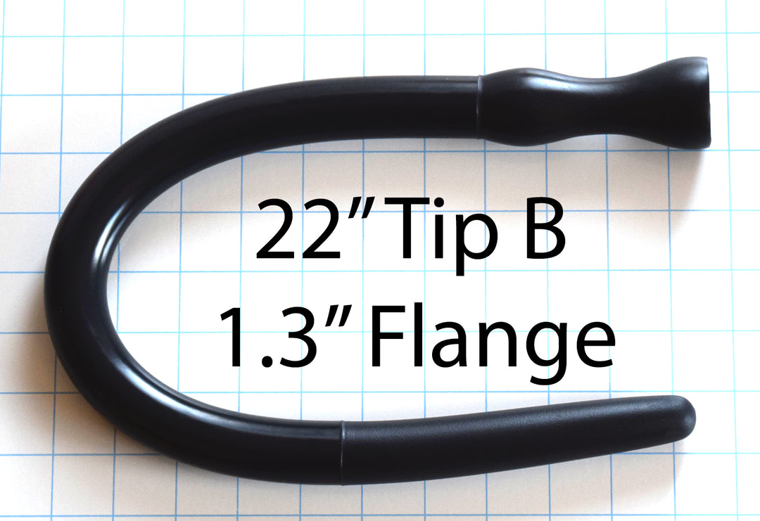 1" diameter, 22-inch black silicone enema nozzle, Tip B design with 1.3-inch flange, shown on a grid background. 