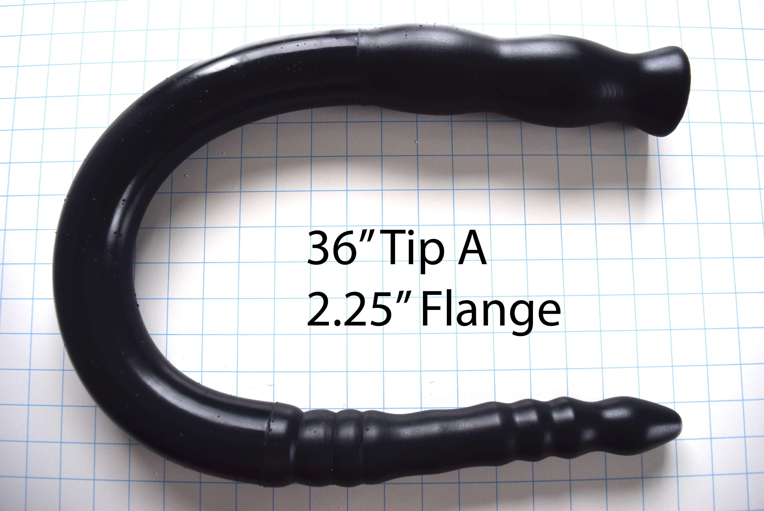 2-inch diameter, 36-inch black silicone colon tube with Tip a design and 2.25-inch flange, shown on a grid background.