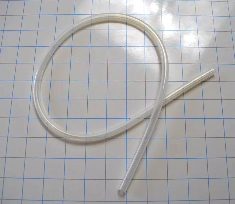 Coil of flexible translucent platinum-cured silicone tubing featuring 5/16 inch inside diameter and medium wall thickness on a grid background.
