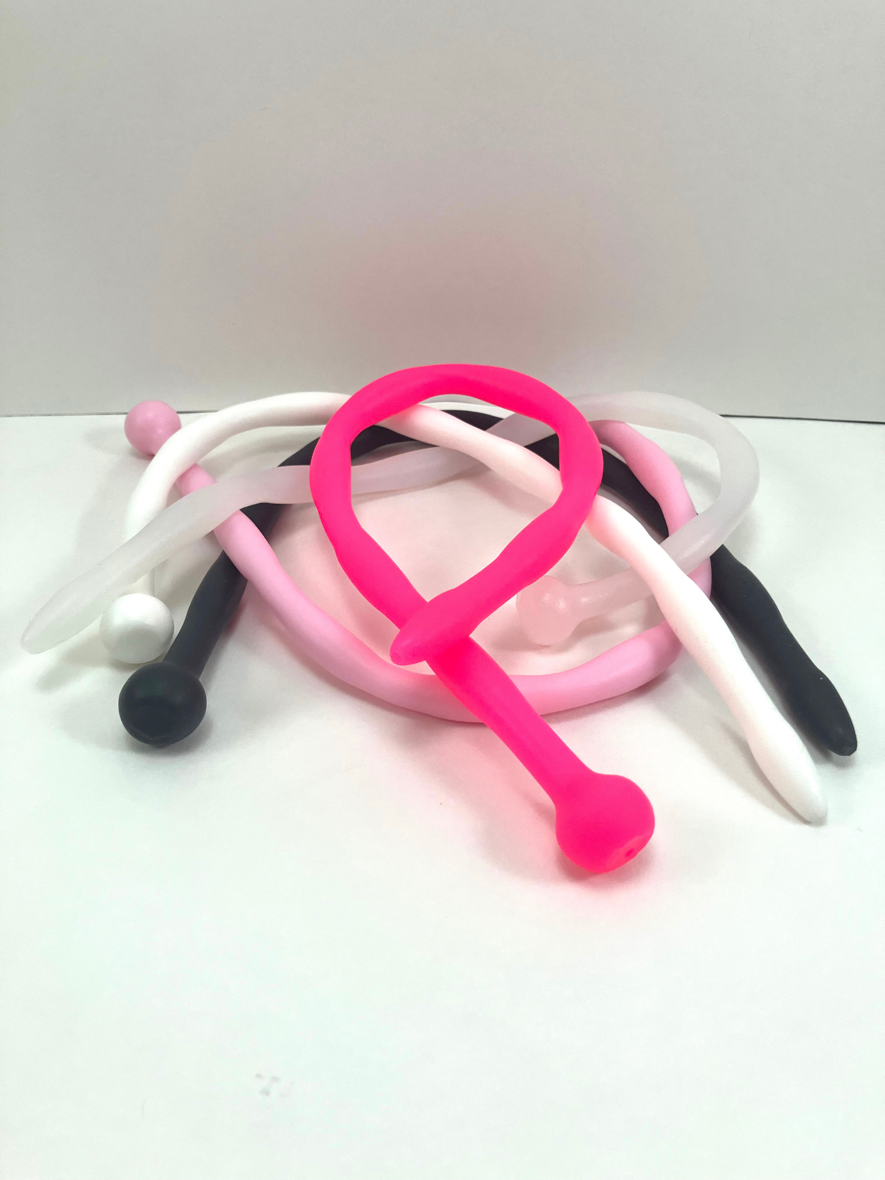 SSND-JAS4 urethral sound with egg-shaped tip and 7 sensory ball segments, showing 8-10mm diameter variations along 13-inch length