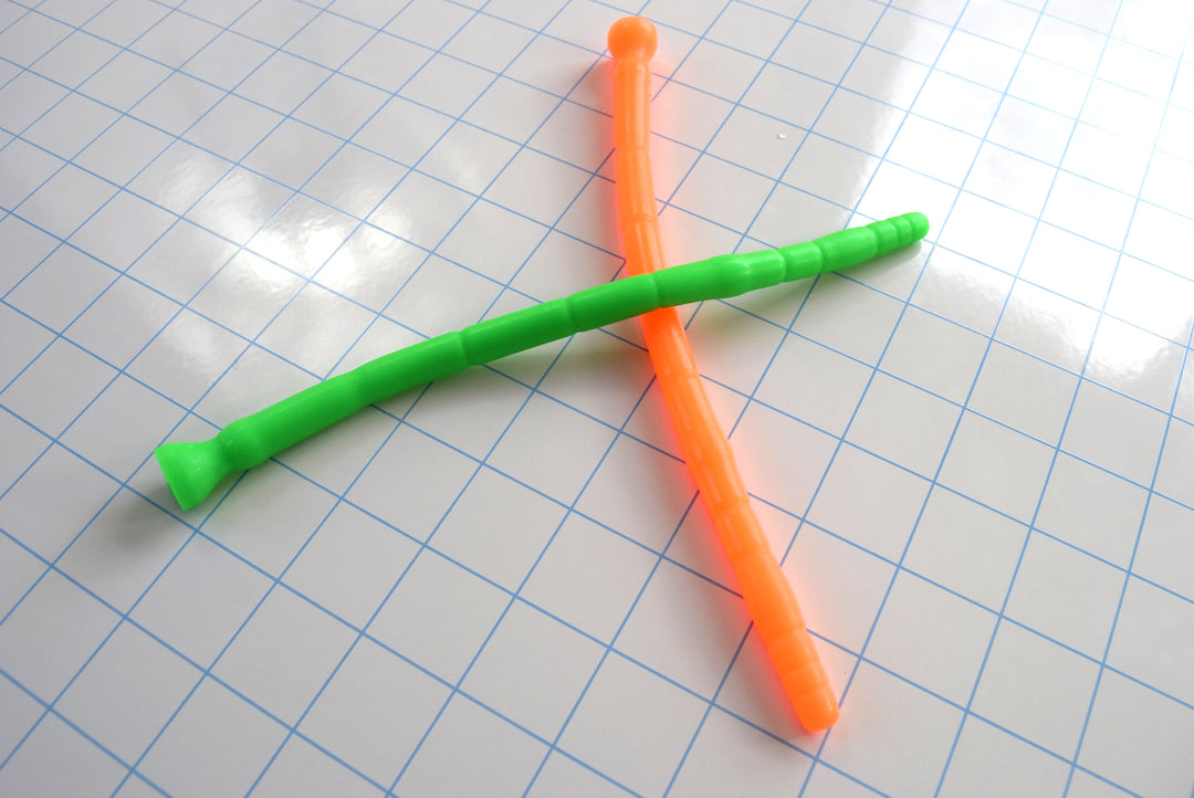 SSND-MLTIDML model, 8-12mm (24-36Fr) diameter, multi-dimensional design, 8" insertable, graduated segments, retention valley, safety base flange, silicone