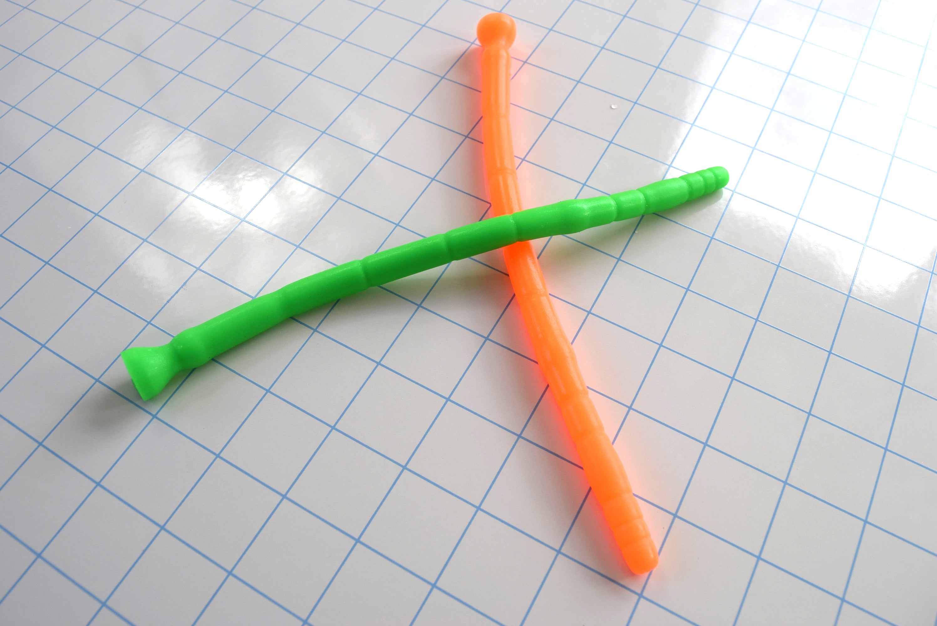 SSND-MLTIDML model, 8-12mm (24-36Fr) diameter, multi-dimensional design, 8" insertable, graduated segments, retention valley, safety base flange, silicone