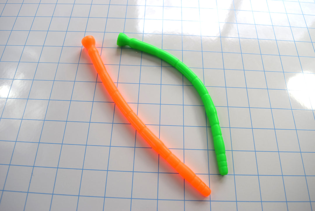 SSND-MLTIDML model, 8-12mm (24-36Fr) diameter, multi-dimensional design, 8" insertable, graduated segments, retention valley, safety base flange, silicone