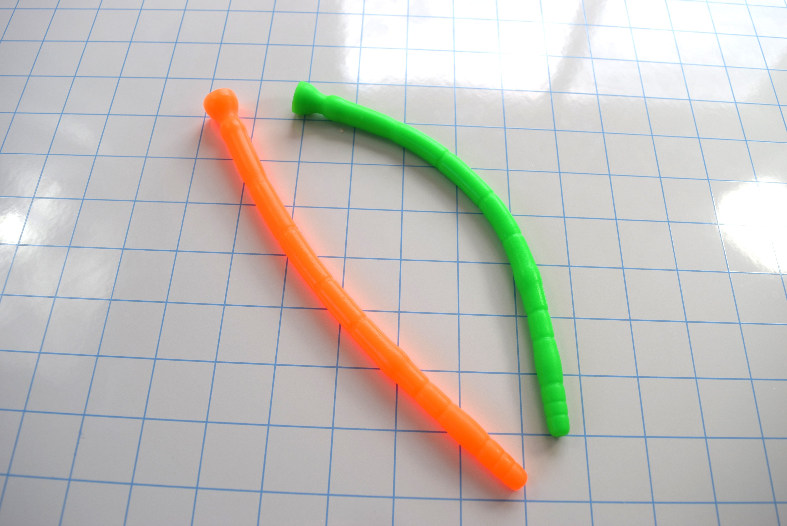 SSND-MLTIDML model, 8-12mm (24-36Fr) diameter, multi-dimensional design, 8" insertable, graduated segments, retention valley, safety base flange, silicone