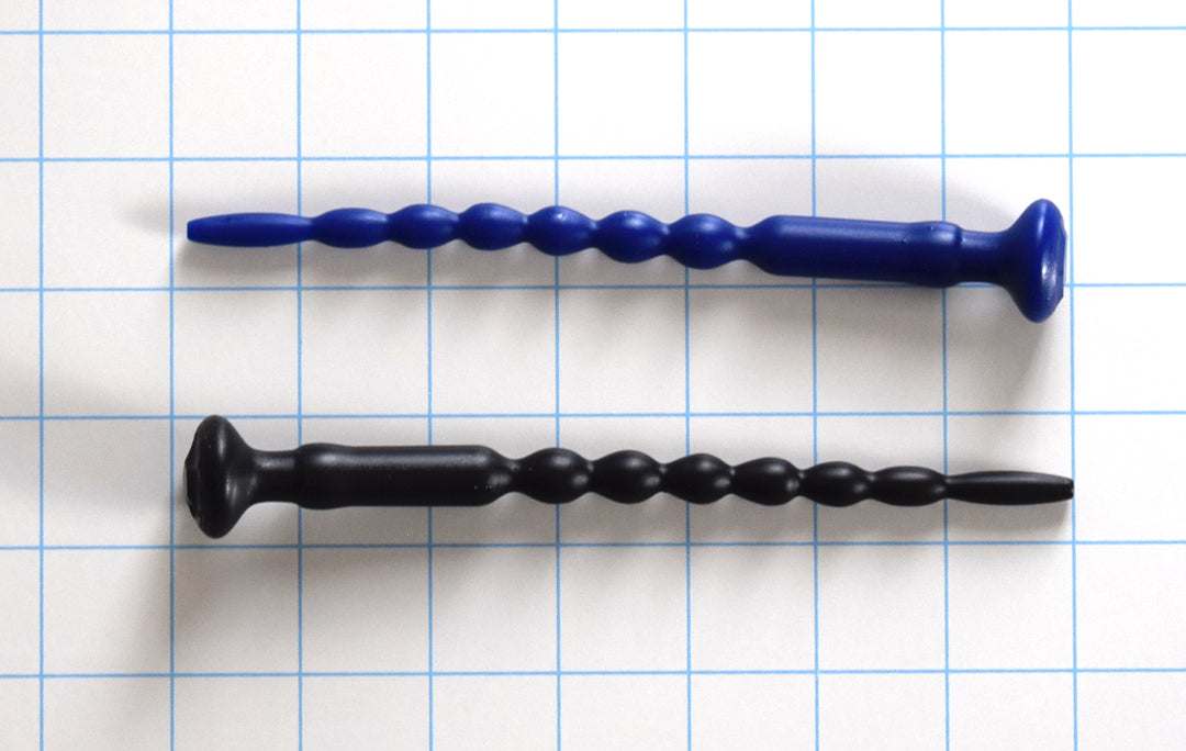 MRB7-13Remix ureathral sound, 2 pieces, one blue and one black on a with background with blue grid