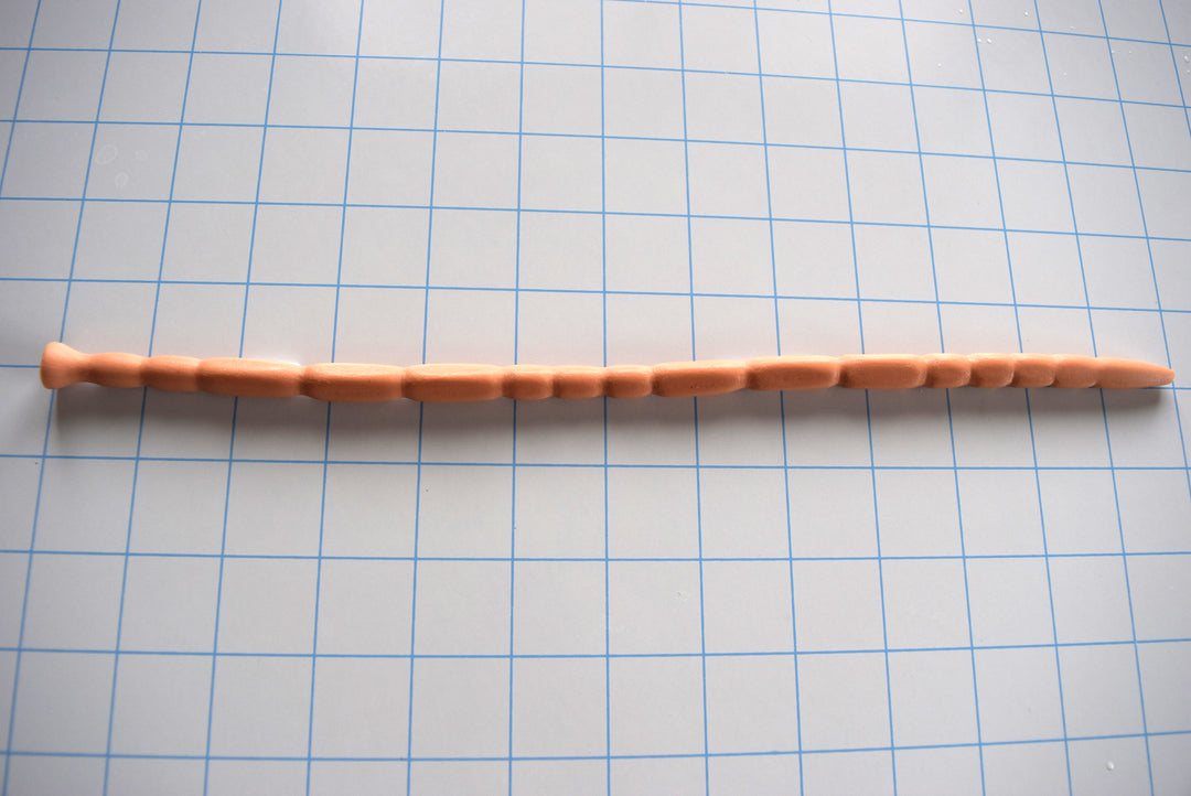 SSND-MRBCUBE urethral sound with unique squared cross-section design, 15 ribbed segments, 12-inch length, 8-9mm diameter