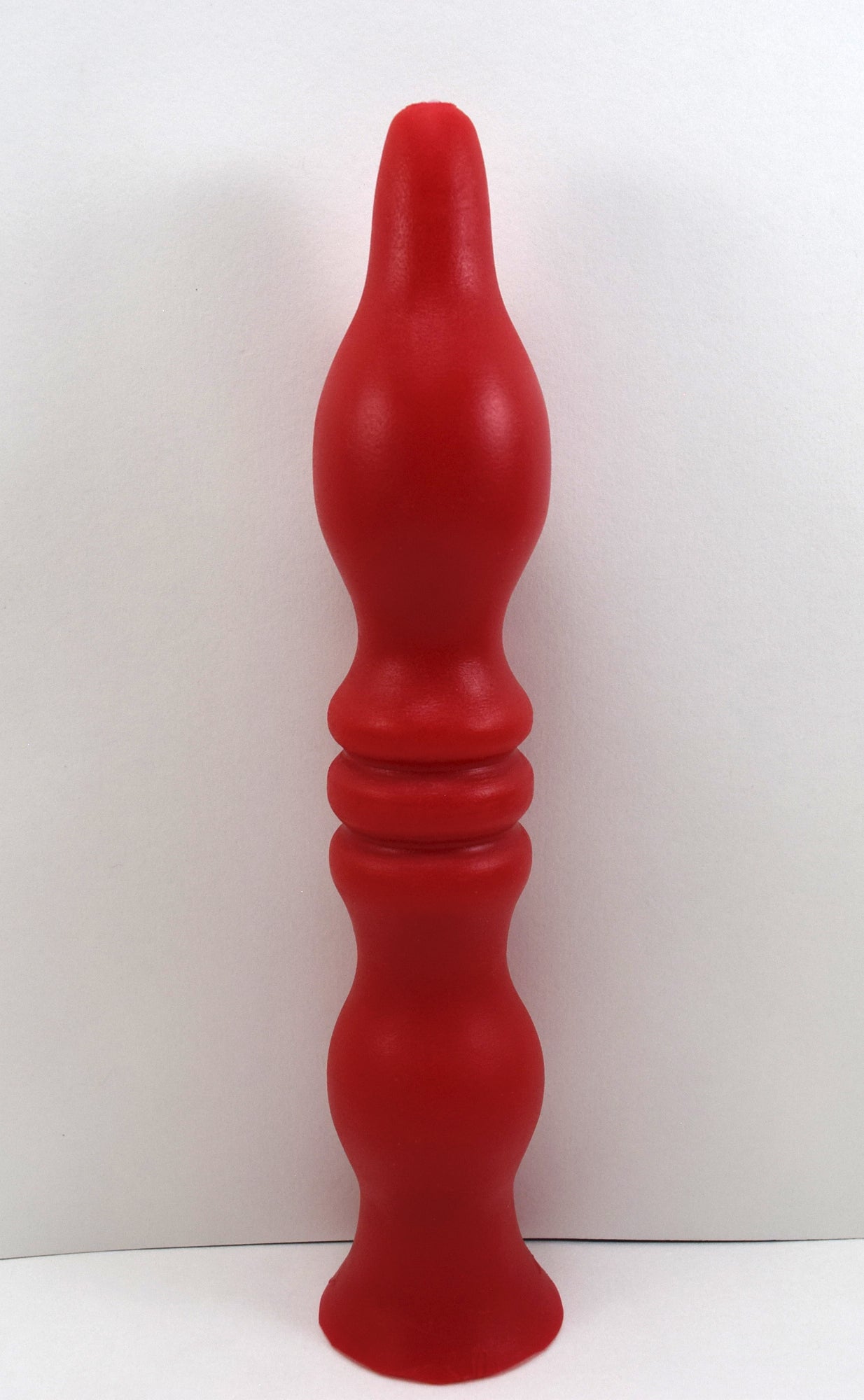 Mini B ball seal enema nozzle in red silicone showing 1.6-inch egg-shaped sealing ball and ribbed shaft design, 9.5-inch overall length