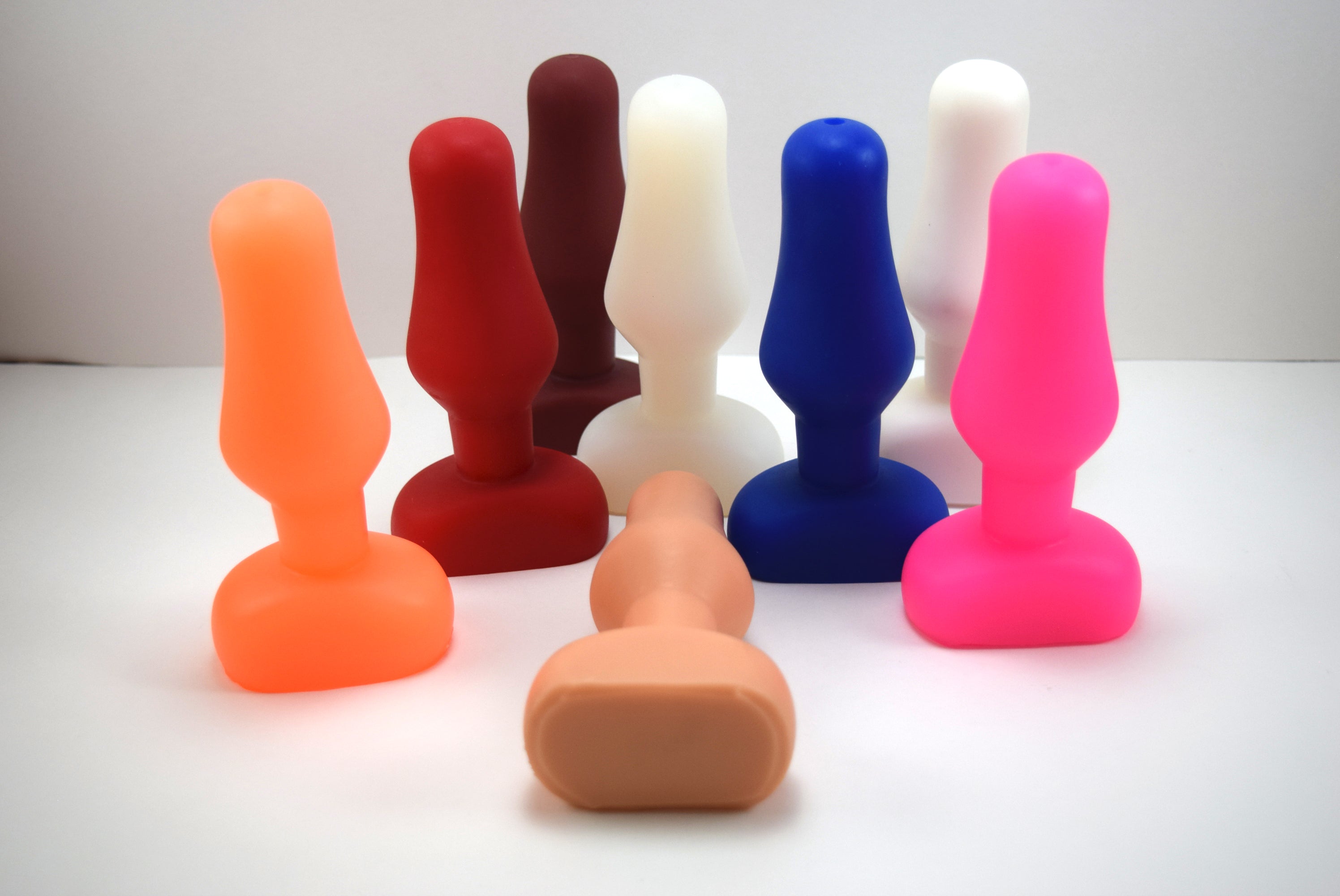 6-inch oval flange-style silicone enema nozzle with 1.9-inch maximum diameter swell, contoured oval flange, 4.5-inch insertable length