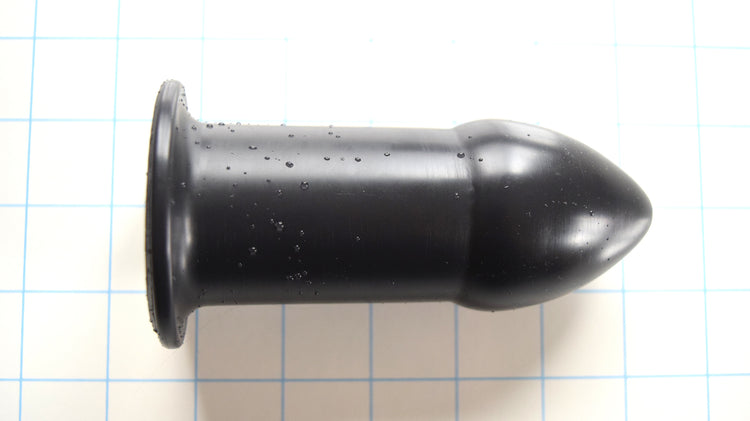 RTDL 2 large rectal training dilator in platinum-cured silicone with 2-inch tapered tip and safety flange