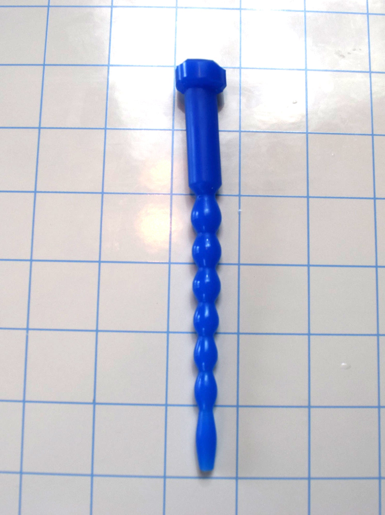  SSND-MD model, 7-12mm (21-36Fr) diameter range, multi-diameter design, 8 graduated segments, 5.25" insertable, multi-ribbed, flanged base, silicone