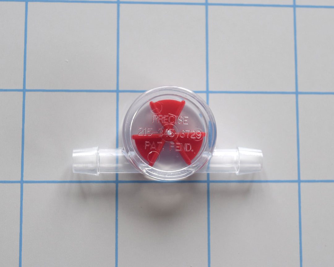 Inline liquid flow indicator for 1/4 inch tubing with a clear body and a small red wagon wheel style spinner paddle, shown on a white background.