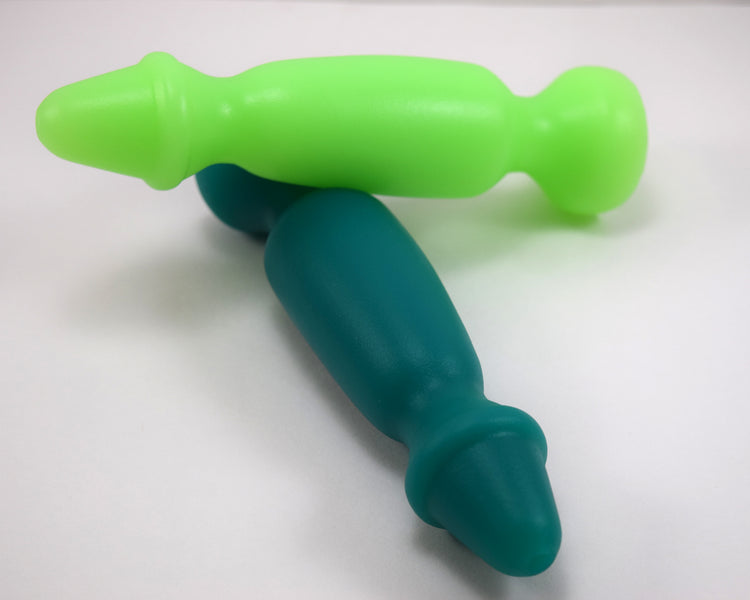 Bright green and teal Bishop 7-inch silicone enema nozzles featuring a tapered expanded ring tip, slim retention valley, and flanged base.