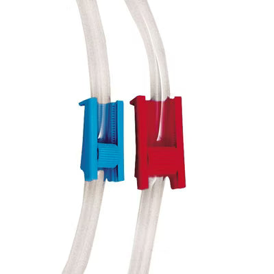 Blue roller-style ramp flow control clamp shown attached to clear flexible tubing alongside a red clamp.