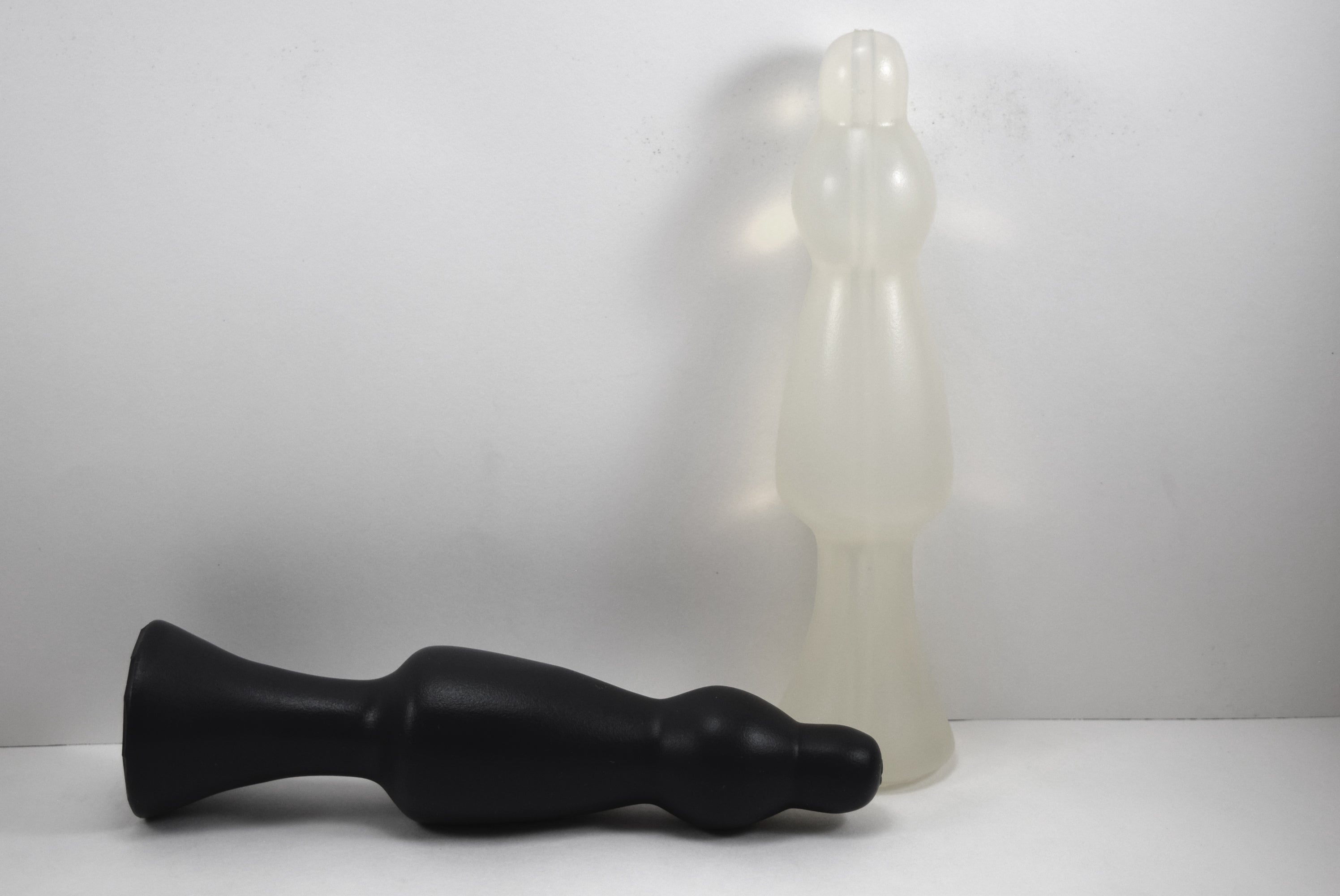Bulbous 3 silicone enema nozzle with a graduated, tiered design, 2.1-inch maximum diameter, and 7-inch insertable length on a white background