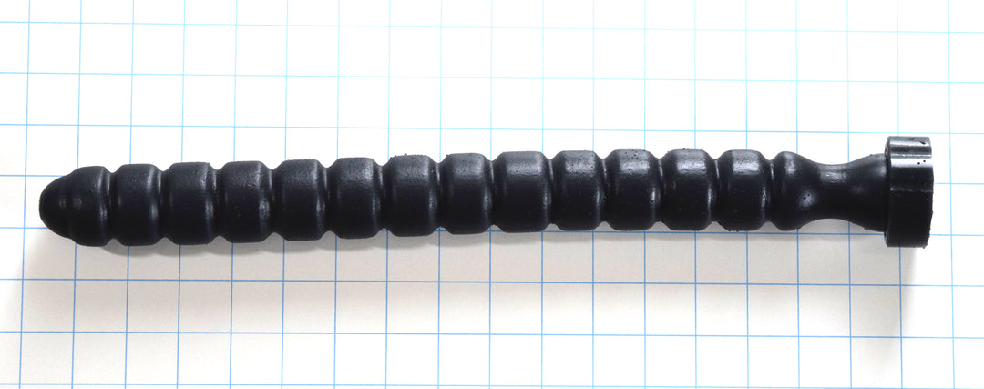 Caterpillar 16 inch silicone enema nozzle featuring 12 graduated barrel ribs, retention valley, and safety flange.