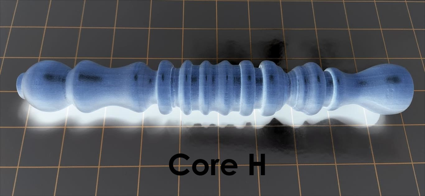 Core H multi-section solid mold insert featuring alternating valley ribs, a prominent suction texture section, and a fluted ball end for silicone enhancement sleeves.