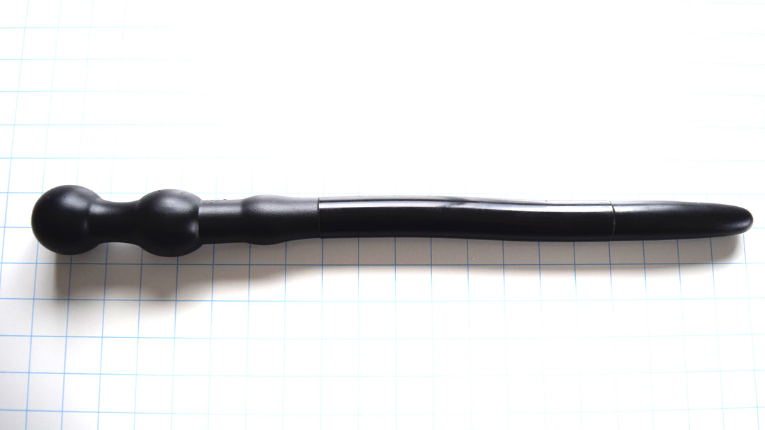 Deep Throat Training 1 1/8 inch silicone gag reflex trainer available in 18 inch and 24 inch lengths with retaining gag ball base.