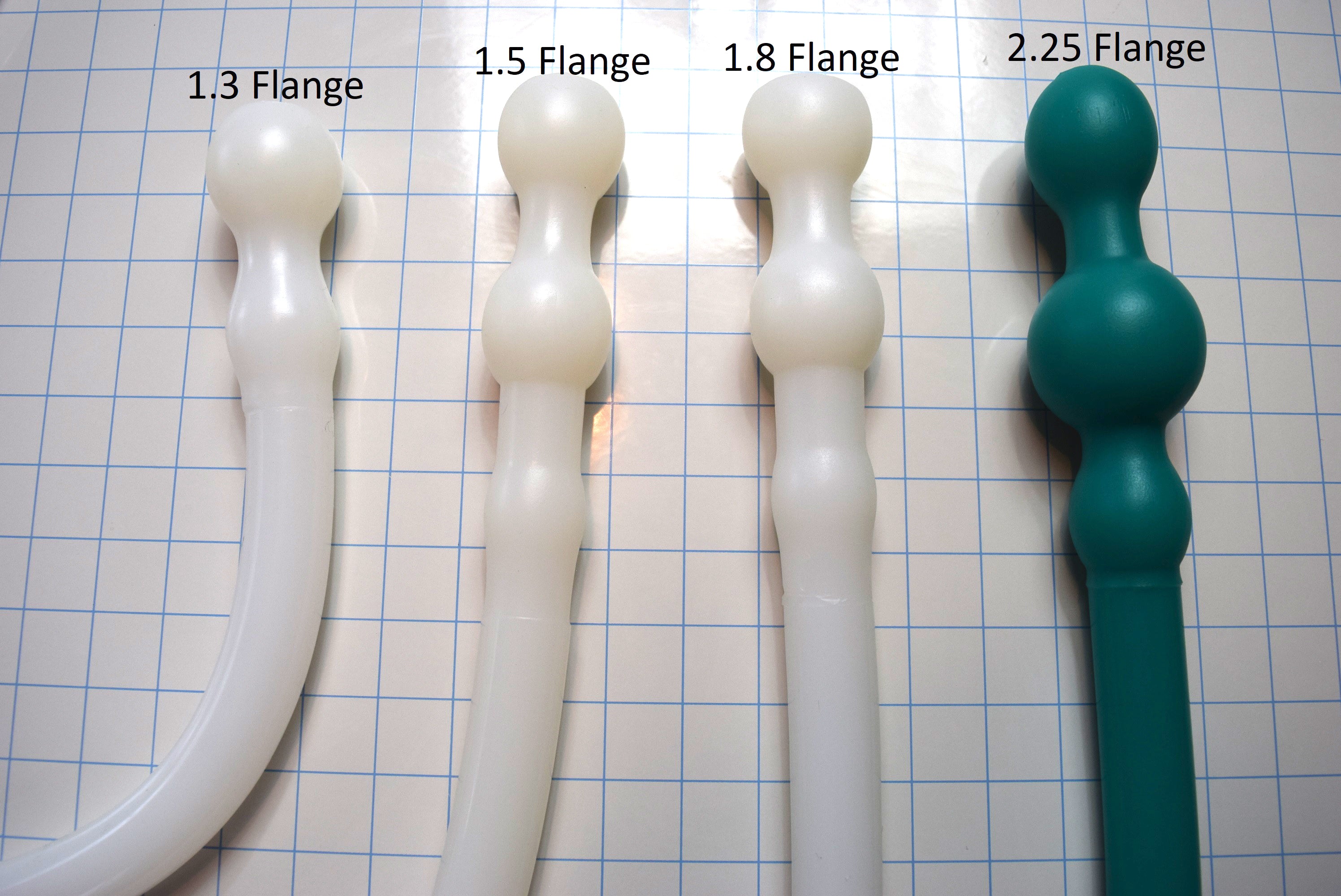 Deep Throat Training silicone oral trainer retaining gag ball options showing 1.3 inch, 1.5 inch, 1.8 inch, and 2.25 inch flange sizes side by side.