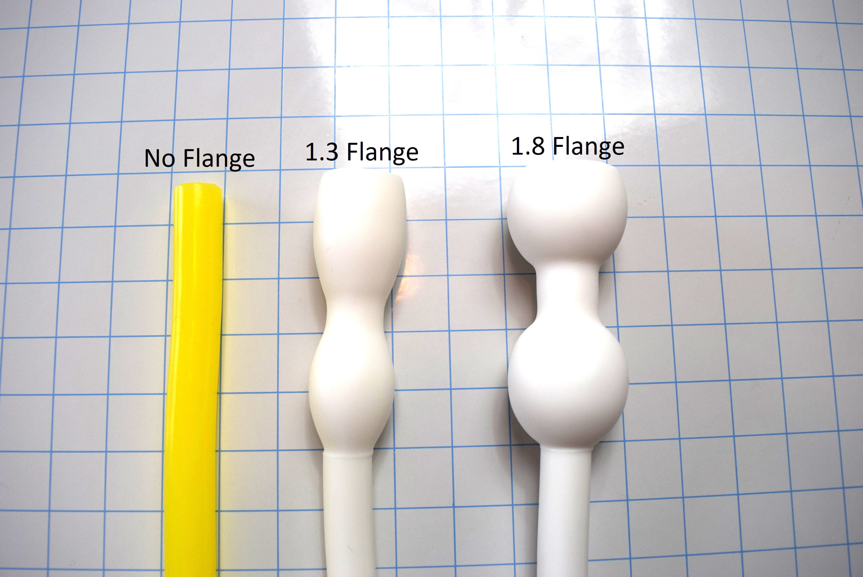 Three silicone Deep Throat Training tubes showing No Flange, 1.3-inch Flange, and 1.8-inch Flange options on a white grid background