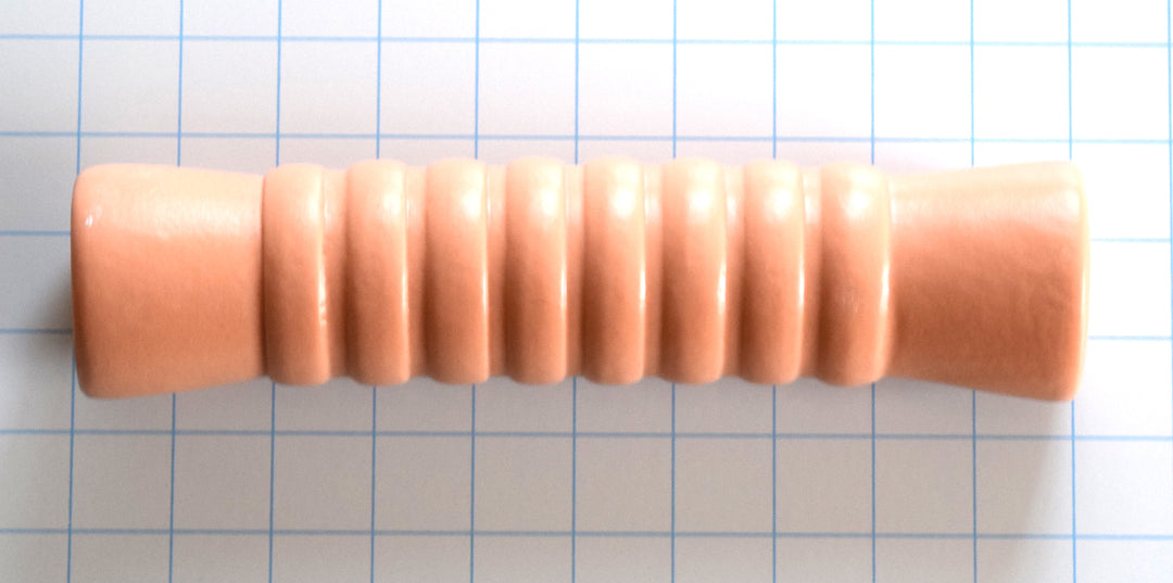 ESS 2 9.5-inch ribbed silicone enhancement sleeve featuring an ergonomic two-hand grip design and textured exterior