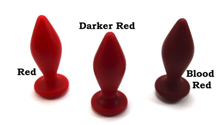 Expanded Diamond 1-inch silicone retention nozzle color comparison lineup showing Red, Darker Red, and Blood Red variants on a grid background.