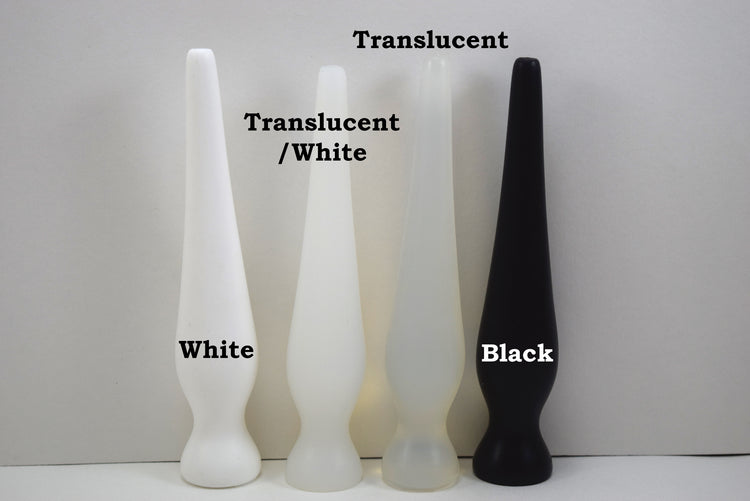 EXT CON 1.0 inch silicone retention plug lineup comparing white, translucent white, clear translucent, and solid black options.
