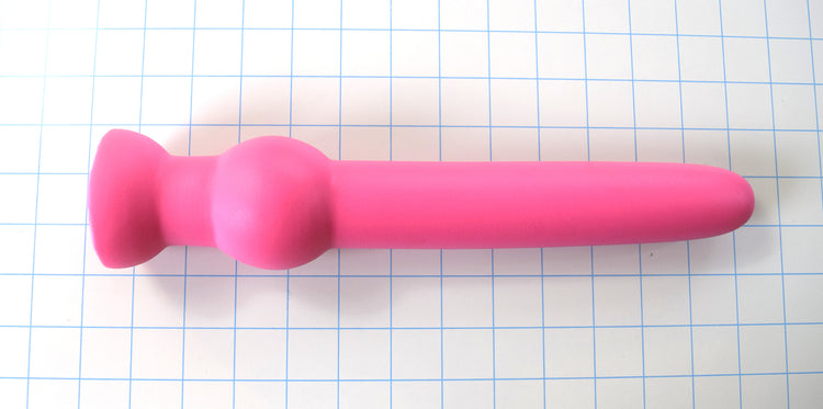 GRB 122 12-inch smooth silicone retaining ball colon nozzle featuring a 1.6-inch shaft diameter, 11-inch insertable depth, 2.4-inch retention ball, and flared safety base flange on a blue grid background.