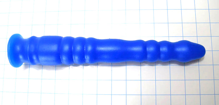 GRB 152 13-inch enhanced rib-style colon nozzle featuring 1.5-inch tip ribs, smooth mid-section, graduated rear ribs up to 1.7 inches, 2-inch base sections, and a safety retention flange on a blue grid background.