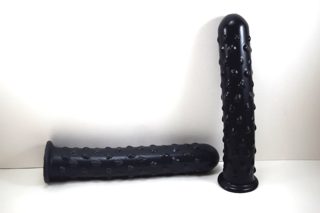 2 Black silicone Knobby Jumbo nozzle with textured surface, 1.75 inch diameter, and safety flange on a white background