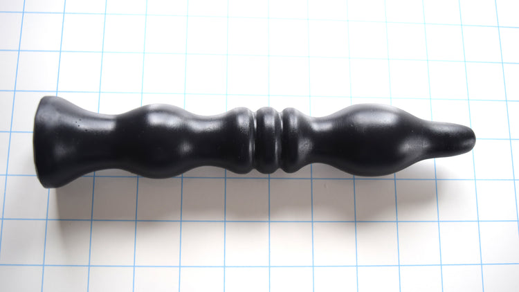 Mini B ball seal enema nozzle in red silicone showing 1.6-inch egg-shaped sealing ball and ribbed shaft design, 9.5-inch overall length