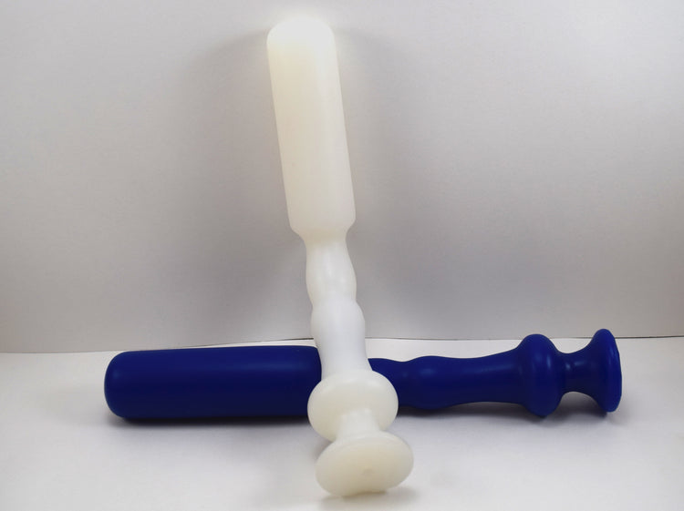 Model C 12-inch translucent white silicone nozzle featuring a prominent barrel-shaped tip, tapered ribs, and a 2-inch safety flange on a white background