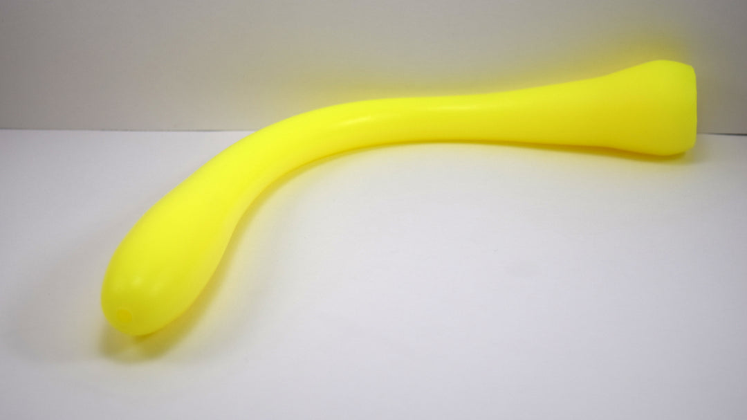 Model O 16-inch long baseball bat style silicone colon nozzle in neon yellow, showcasing its 1.4-inch oval tip, slender 0.85-inch mid-shaft, and 1-7/8 inch expanded base
