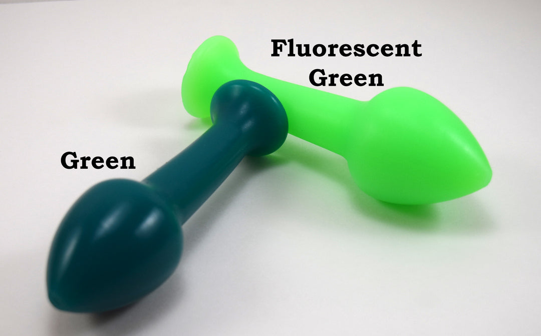 Green and fluorescent green Model Y silicone enema nozzles displaying wide 2-inch tapered entry tips and slender shafts.
