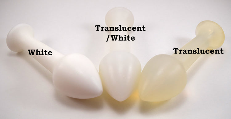 Three Model Y silicone enema nozzles in solid white, translucent white, and pure translucent material options.