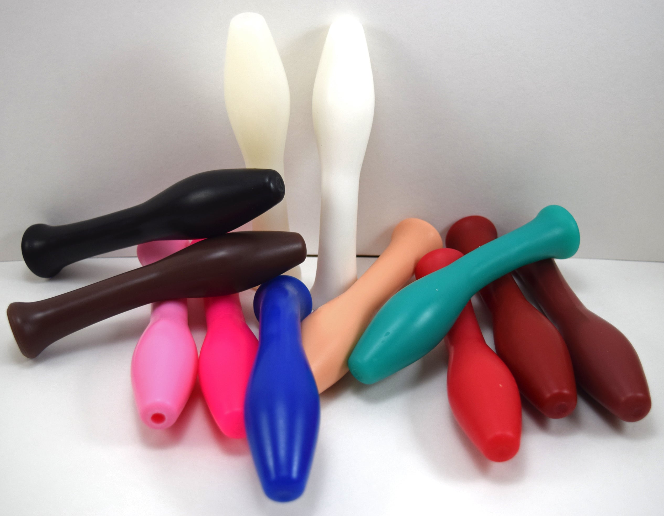 Model S oval tipped silicone enema nozzle with 1.25-inch sloped oval tip, 0.75-inch shaft, 6-inch total length, 5-inch insertable depth