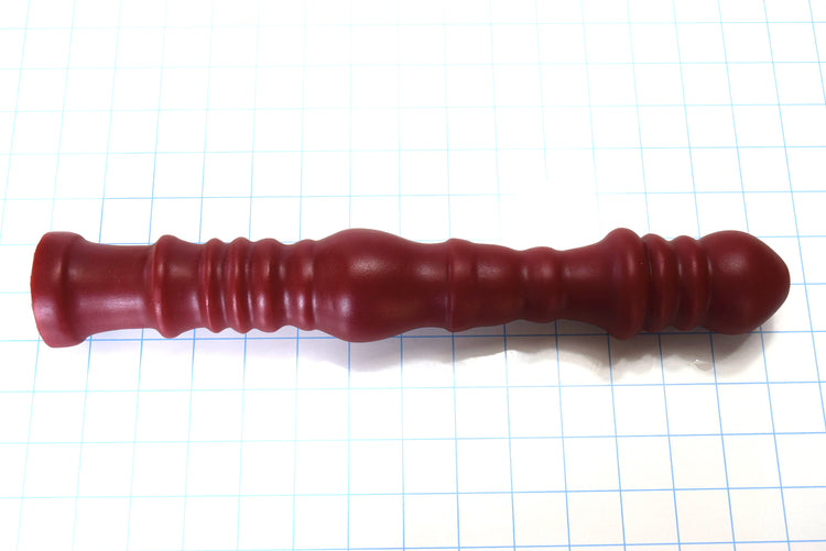 Multi-dimensional 14-inch ribbed and ball silicone enema nozzle with graduated ribs and balls for sigmoid colon delivery, featuring translucent silicone construction with flared safety base