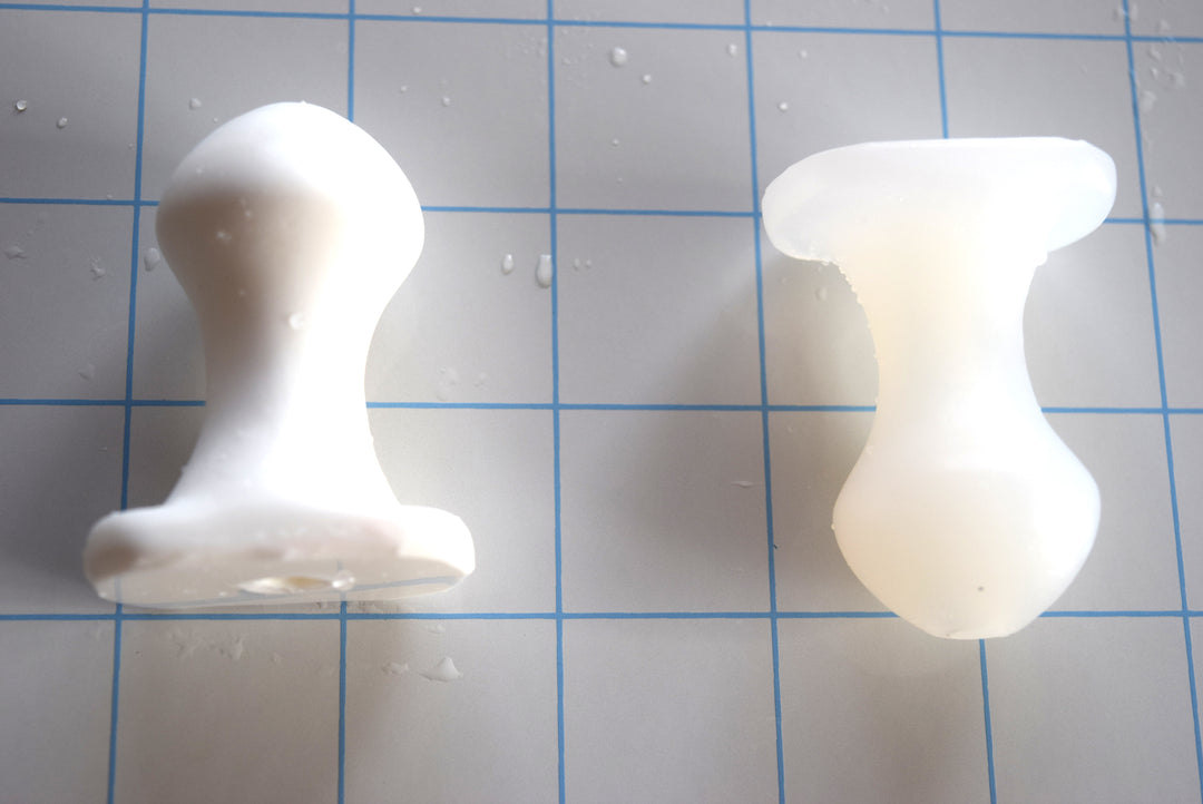 Nubby oval flange silicone plug with 30mm ball tip and retention design, 53mm overall length