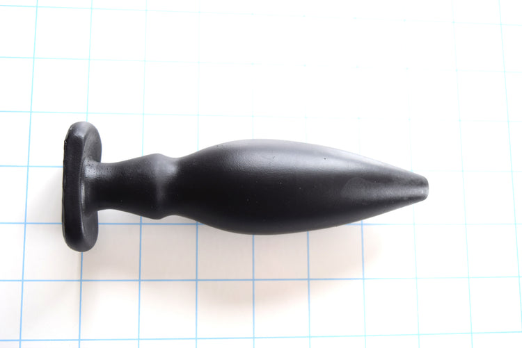 6-inch oval flange-style silicone enema nozzle with 1.6-inch maximum diameter, dual retention valleys, contoured flange, 5.5-inch insertable length