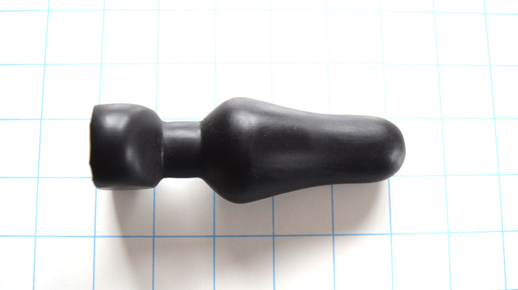 4.7-inch oval flange-style silicone enema nozzle with 1.6-inch maximum diameter, contoured flange, 3.75-inch insertable length