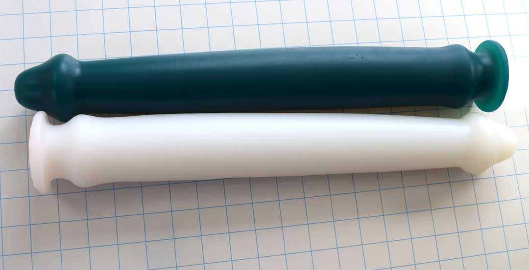 Priapus 18-inch large silicone enema nozzle lineup featuring dark green and white models with 17-inch insertable lengths, 2.5-inch maximum shaft diameters, and safety retention flanges on a blue grid background.