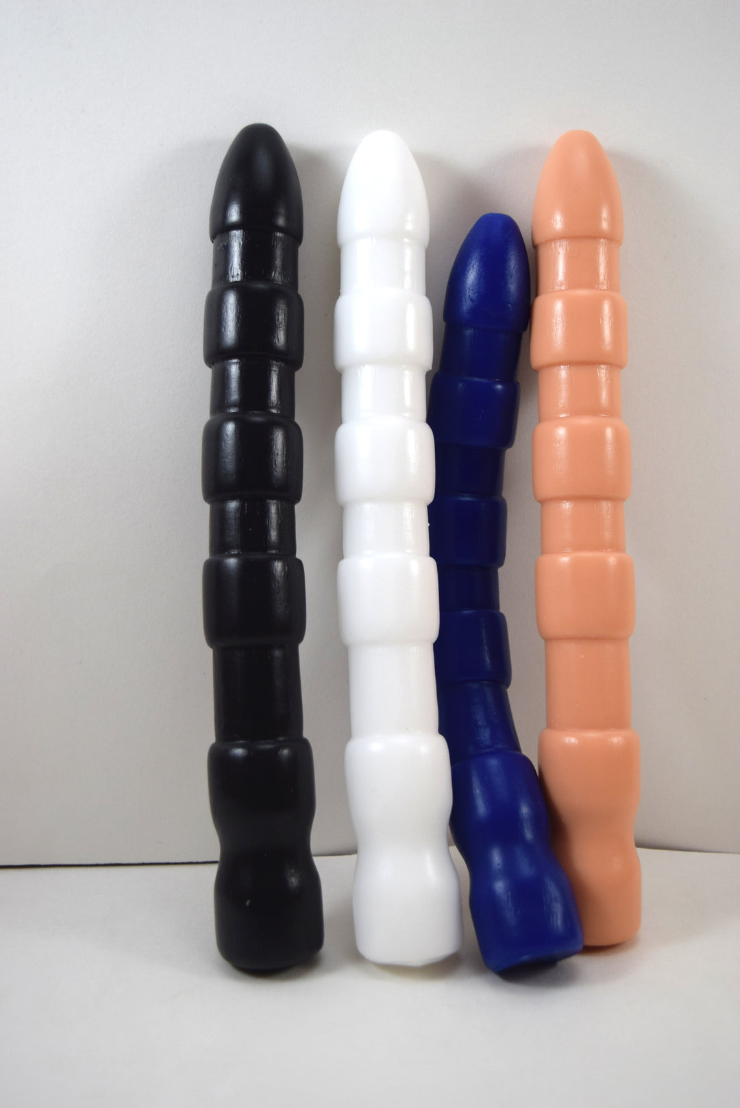 Ribbed Shooter 9 inch textured silicone enema nozzle featuring heavy gauge 28mm ribs, 26mm bulbous tip, and retention flange.