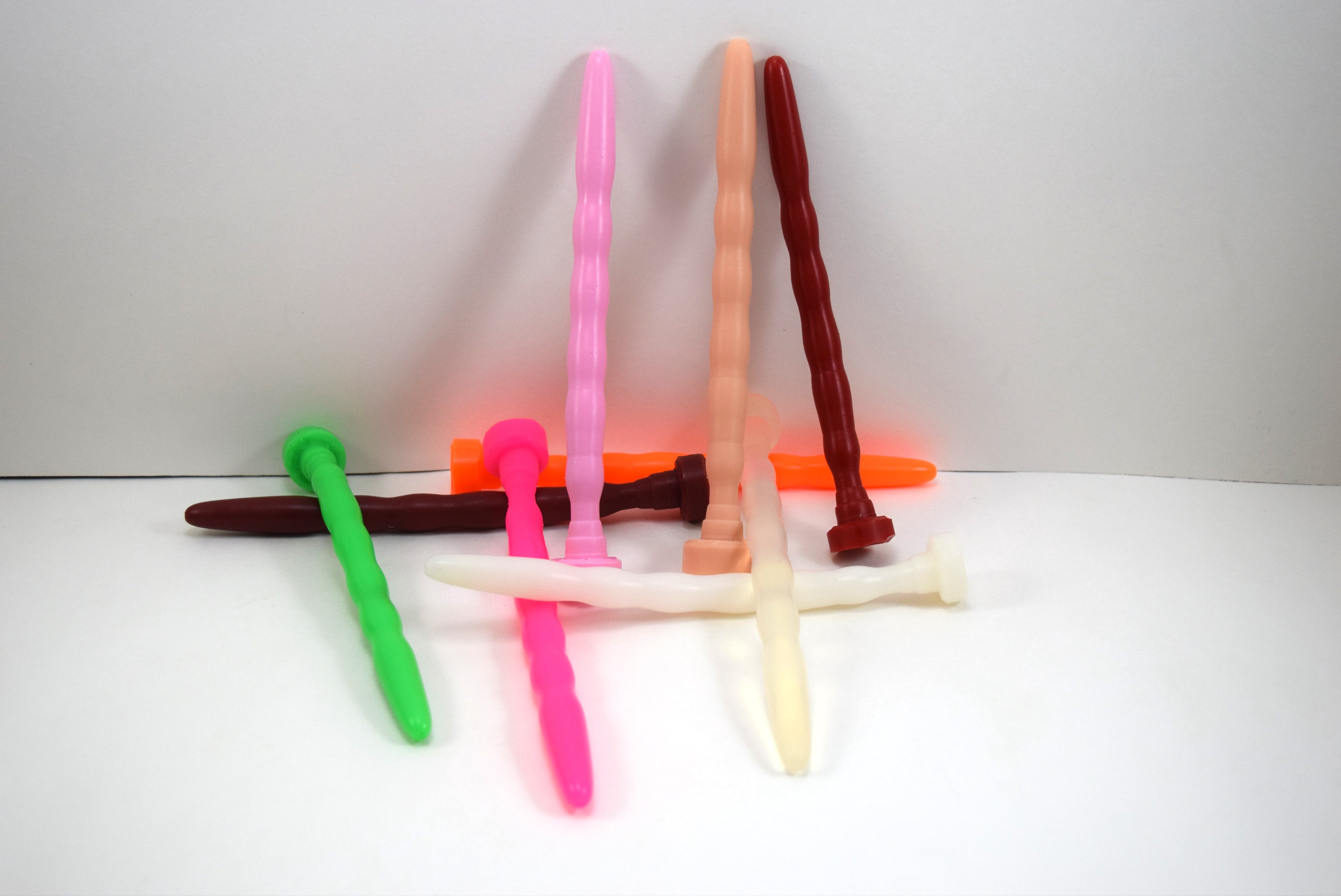 SSND-RIPPLE model, 8-12mm (24-36Fr) diameter, ripple contoured design, 5.75" insertable, five segments, retention valley, flared base flange, silicone